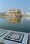 Amritsar - the Golden Temple - the Hari Mandir at the center of the the Pool of Nectar. 